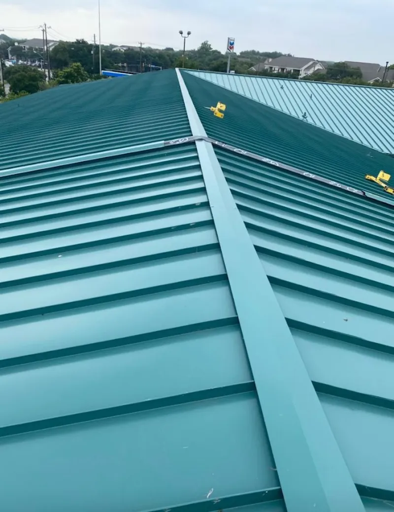 Green commercial metal roof ridge and valley for Metal Roof Repair in Glocester